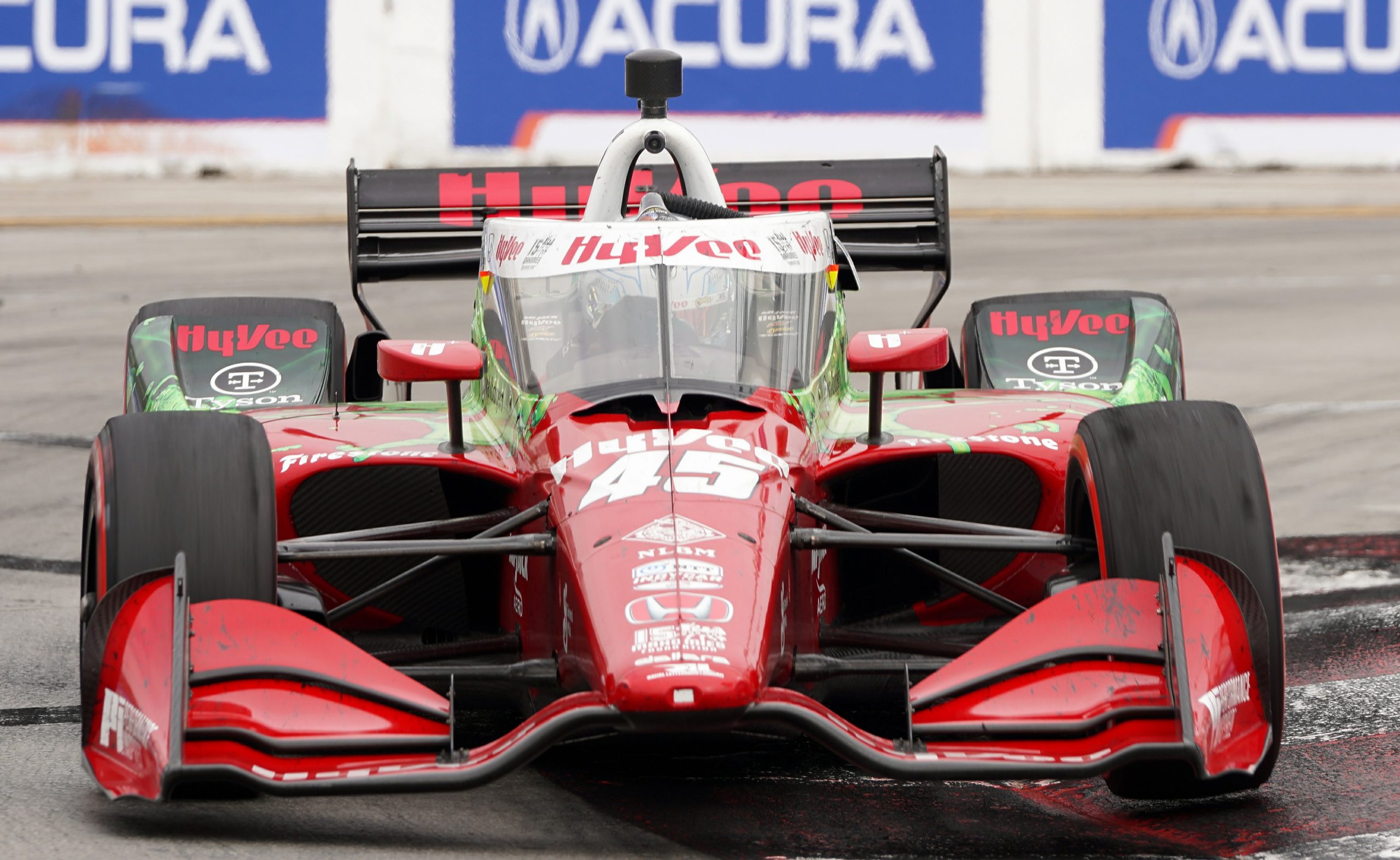 Oliver Askew definitely knows how to hustle a race car around a track as shown here attacking the curbing in Turn 1.