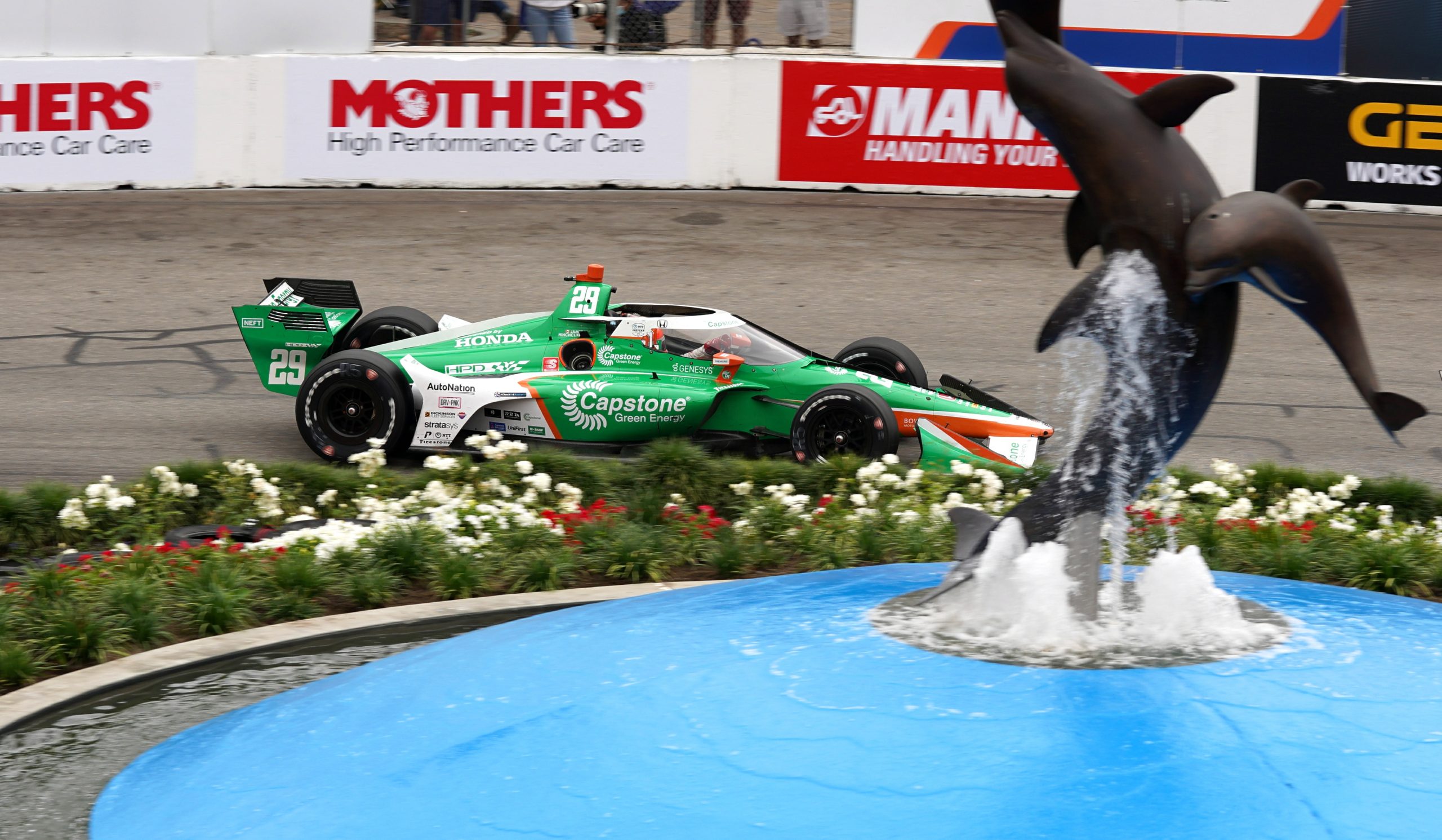 His Capstone Green Energy car is right at home amongst the fountain and greenery of the circuit near the Aquarium of the Pacific.